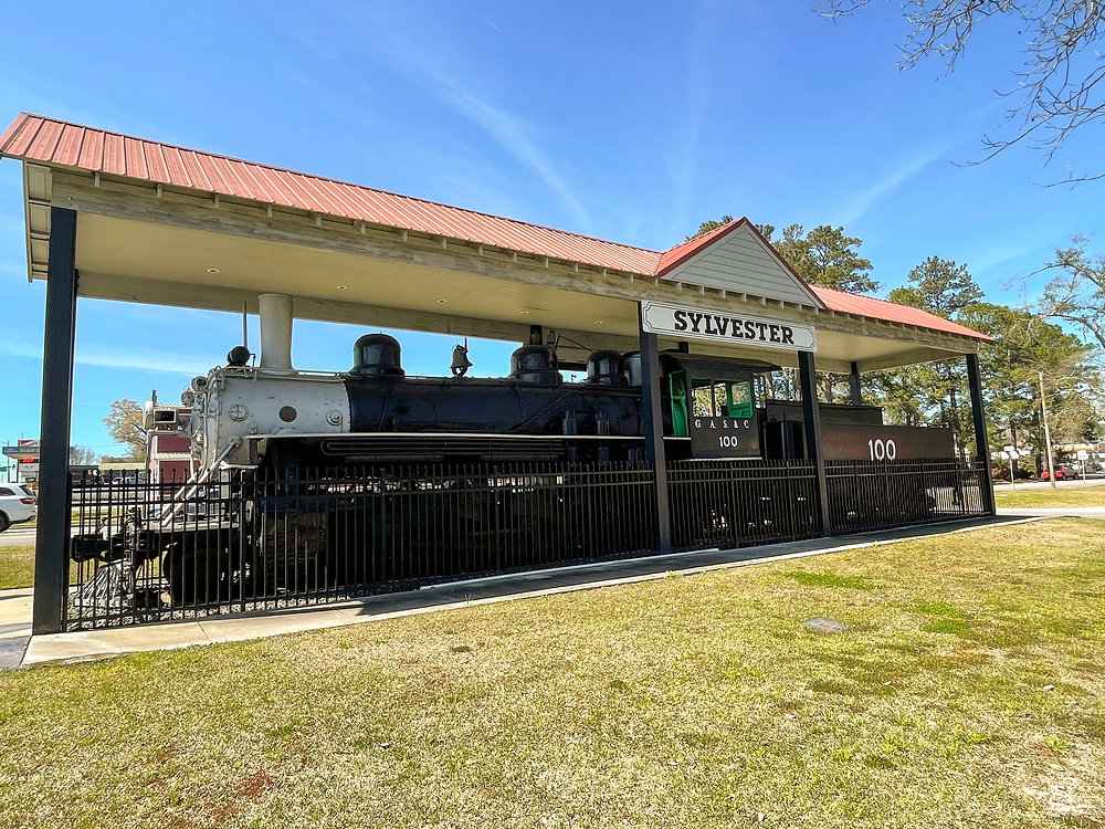 Roofer installing new asphalt shingles on a home in Sylvester GA